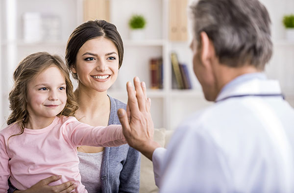 Mother and Child with Pediatrician