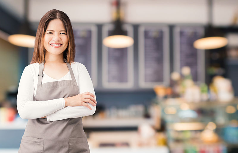 business owner with bakery shop background Restaurant Owner